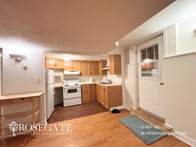 Photo - Spacious 2-Bedroom Corner Basement Apartment with Fireplace & 2 Parking Spaces – Barrie Unit 2