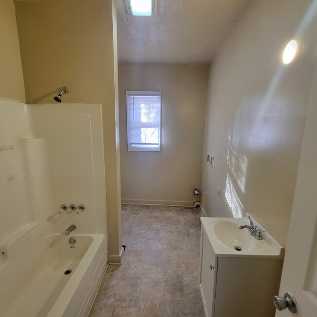 Photo - 3/2 with fenced-in backyard & storage shed