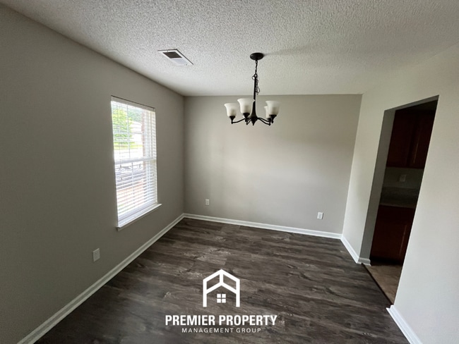 Photo - Beautiful 4BR/2BA Home | 1,605 Sq Ft, Soaring Vaulted Ceilings & 2-Car Garage