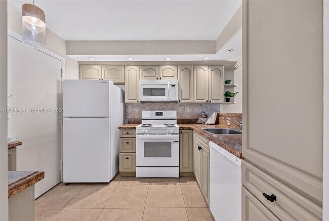 Photo - 8233 Harding Ave Unit 208