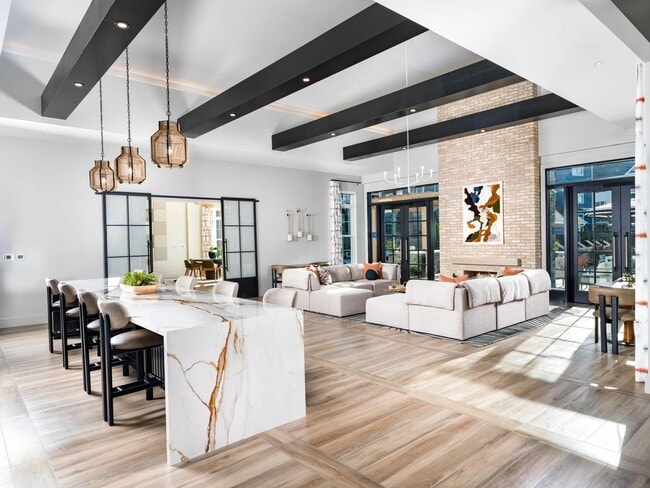 Sleek design and inviting seating make this stylish clubhouse a natural gathering place for residents and guests alike.