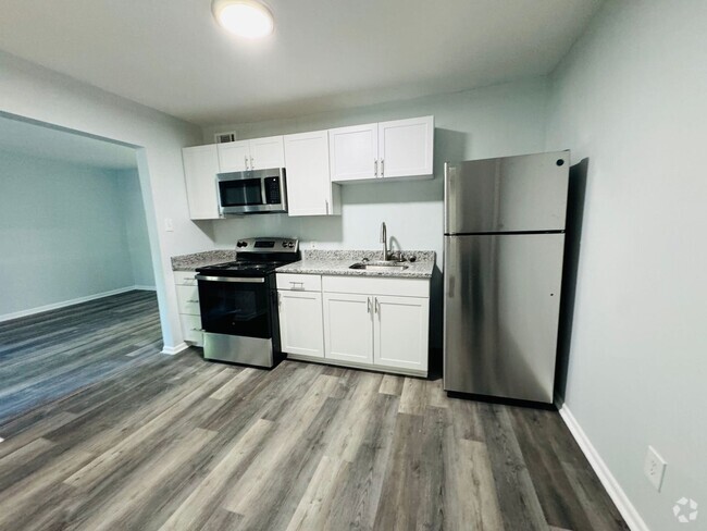 Building Photo - Miller Manor Apartments (Ask About our Mov... Unit 3218