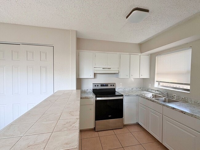 Photo - Charming Largo Home with a Spacious Fenced...