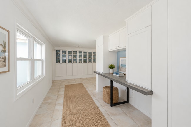 Photo - Live the ultimate Space Coast waterfront lifestyle at this stunning beachside canal home in Satel...