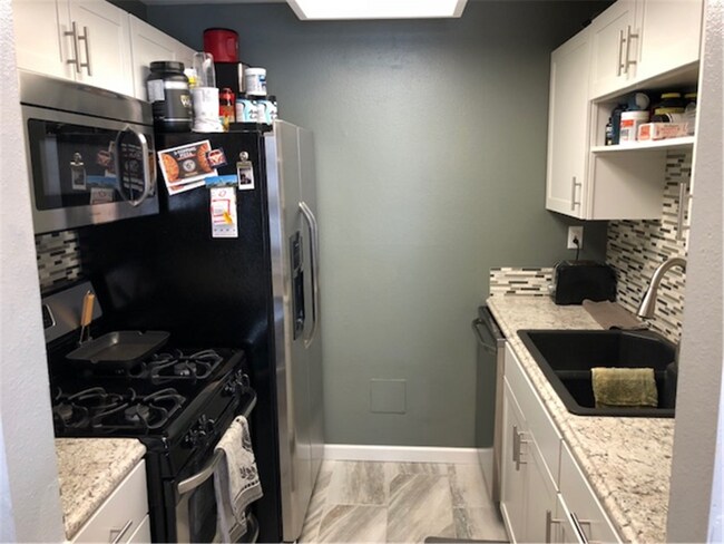 Photo - 5561 S Willow Ln Unit #B