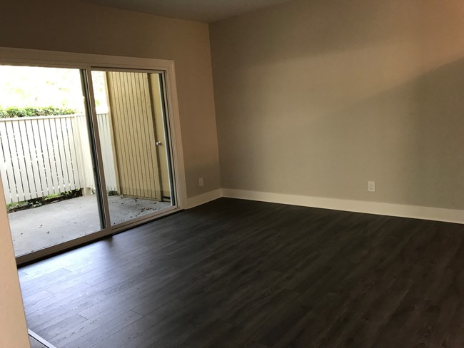 Living room and Patio - 77 Schooner Ct Apartment