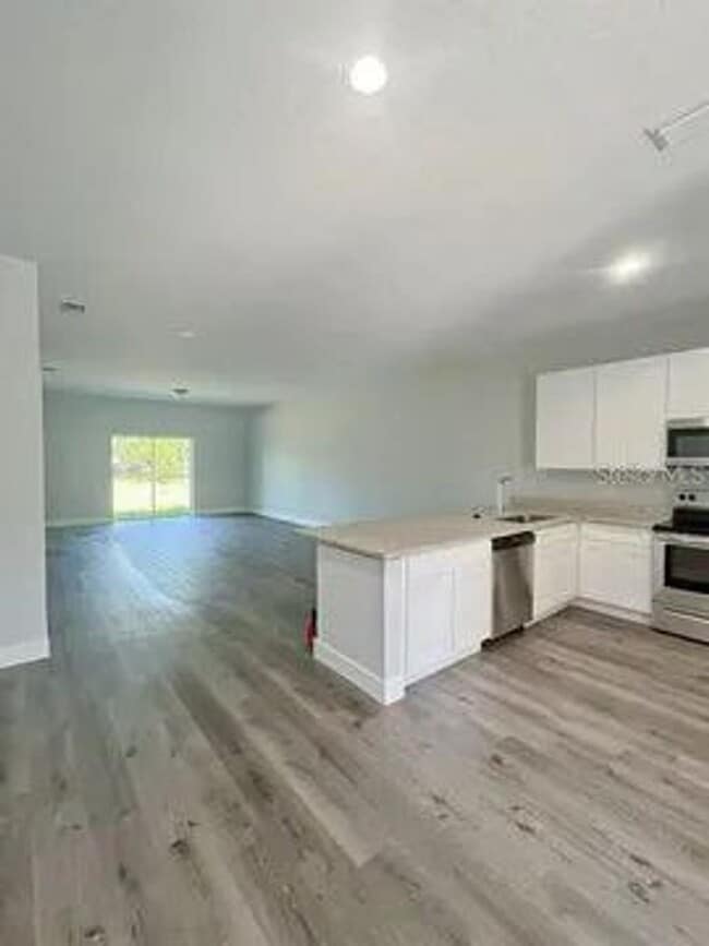 Photo - 13257 Blytheville Ave Unit 13259