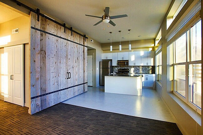Step into a stylish urban loft featuring modern design elements and bright, inviting spaces.