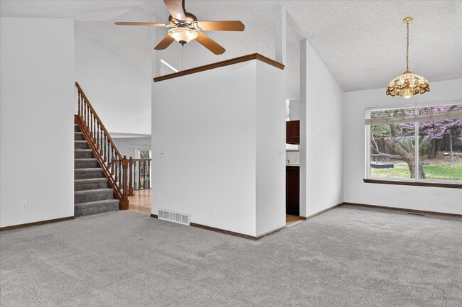 Photo - 4BR/4BA Updated Home with Finished Basement Suite & Landscaped Yard