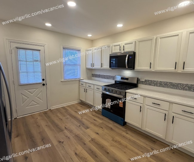 Photo - Spacious 4-Bedroom • 2-Bathroom Single-Family Home