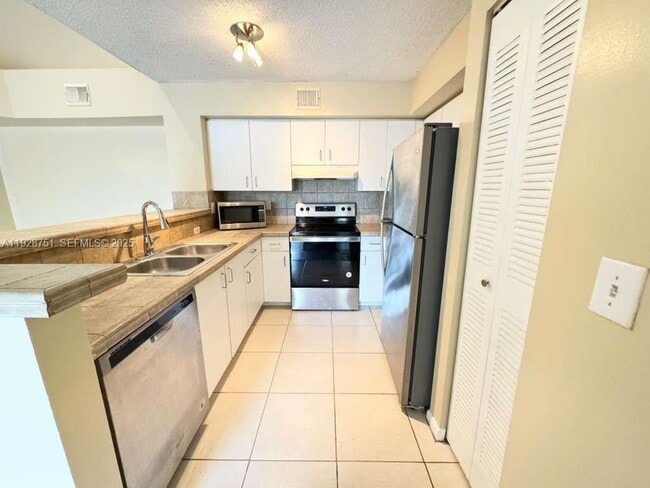 Photo - 1721 Village Blvd Unit 305