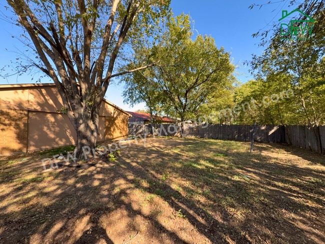 Photo - Cozy 3-Bedroom Home with Fireplace, Covered Patio & Large Fenced Backyard for Lease