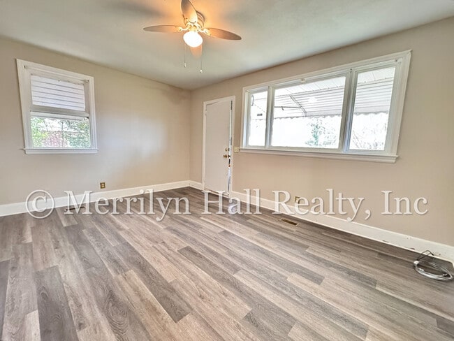 Photo - Freshly Updated 2BR Bungalow | New LVP Floors | Fenced Yard | Quiet Street