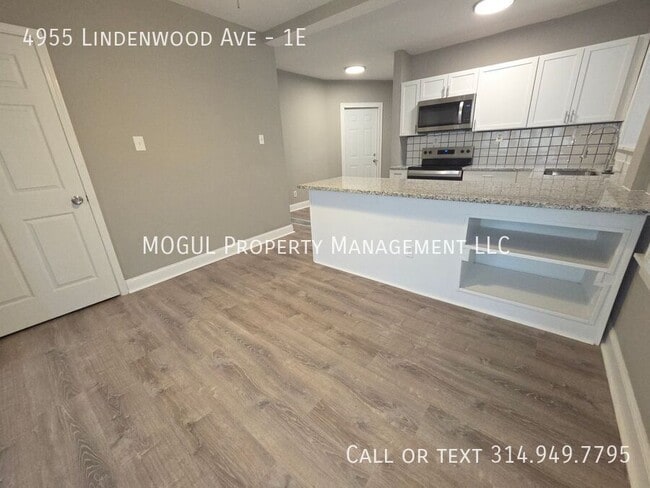 Building Photo - 4955 Lindenwood Ave Unit 1E