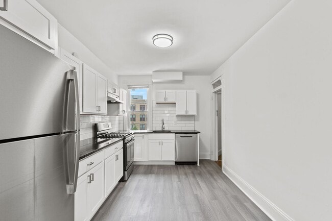 Photo - Spacious 1 Bedroom Apartment with Den - In Unit Laundry!