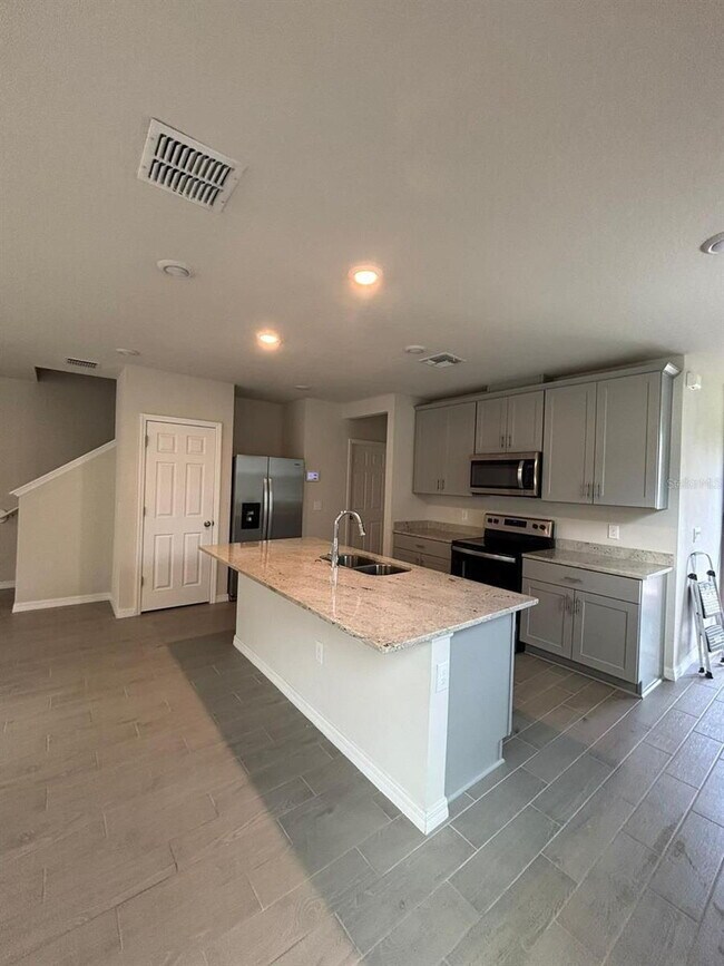 Photo - This beautiful townhouse features an abundance of space and natural light.