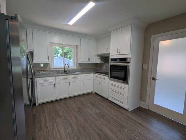 Photo - Ranch with Fence and 20x30 Garage/Workshop with Electric Close to Light Rail