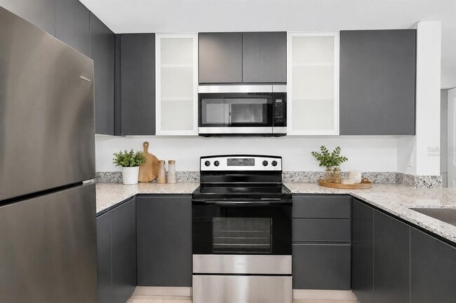 Building Photo - 5579 Millennia Park Dr Unit 310