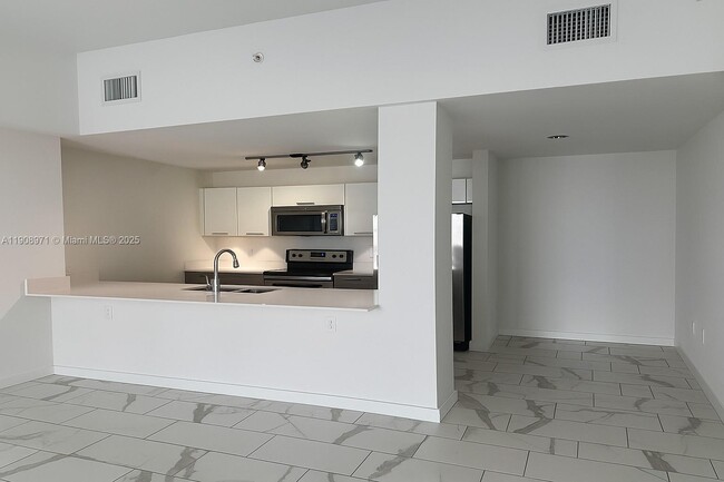 Building Photo - 101 E Camino Real Unit 517