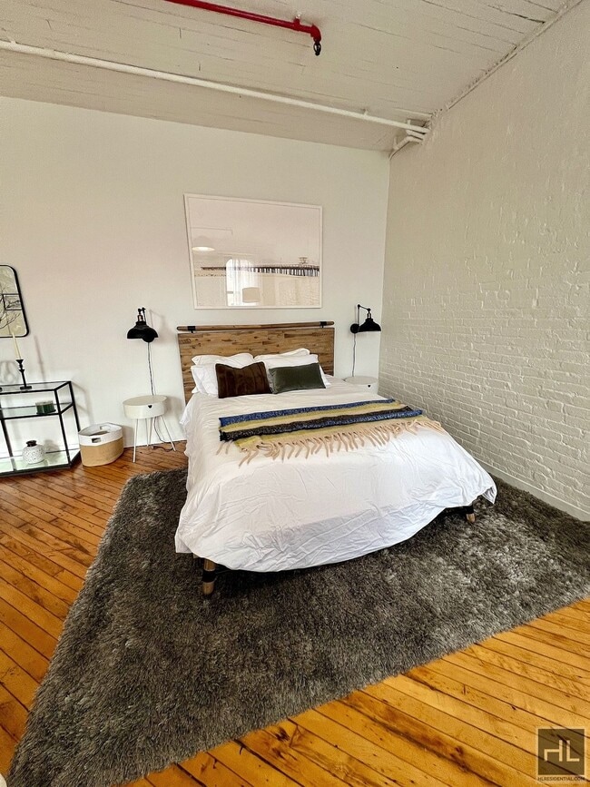 Clock Tower Industrial Loft Studio w/ Pool, Sauna, Rooftop Greenhouse & More Near South Bronx Wat...