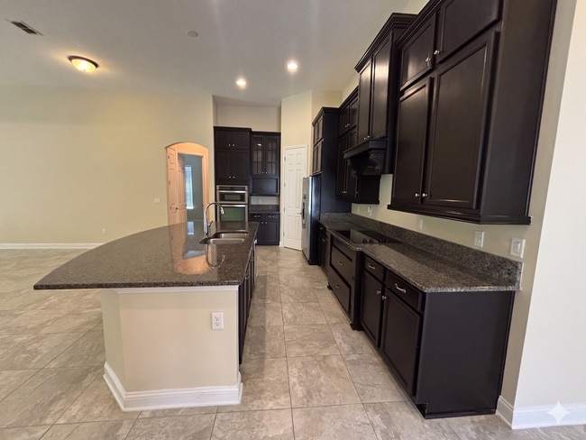Photo - Spacious 4BR/3BA Home with 3-Car Garage, Bonus Office & Covered Patio in St Johns!