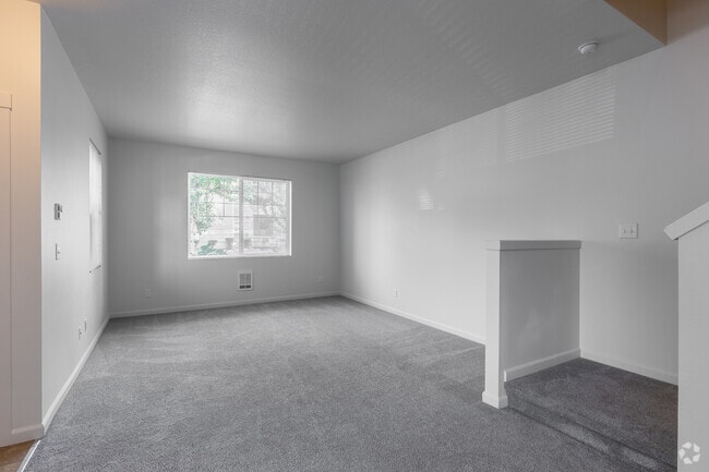 3BR, 2.5BA - 1566SF - Living Room - The Landing Apartments and Townhomes