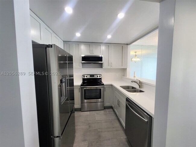 Photo - 601 Three Islands Boulevard Unit 411