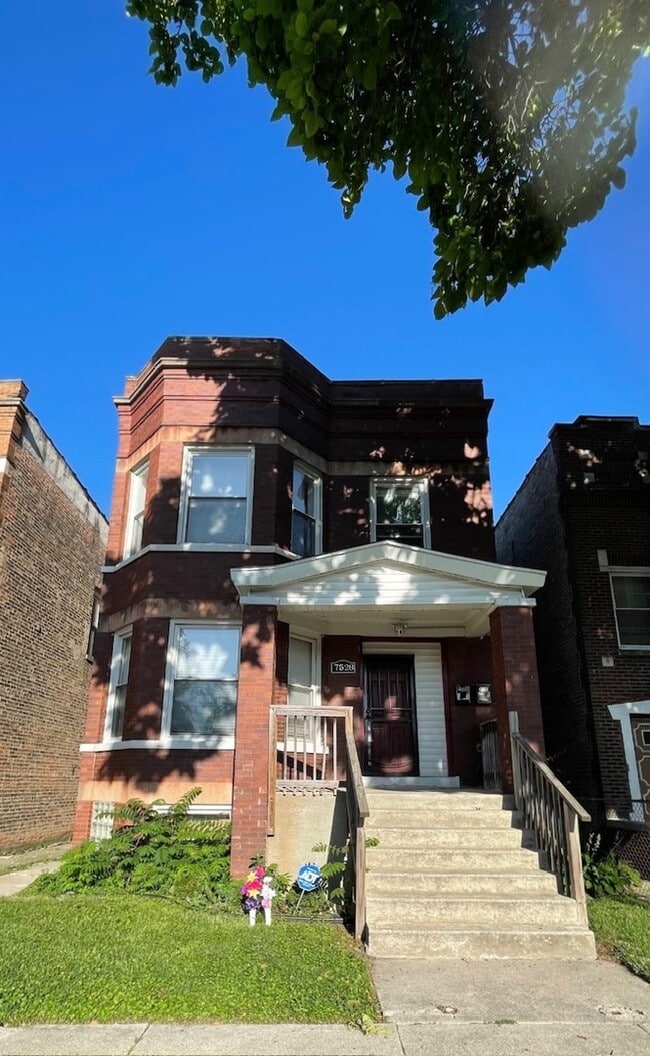 Building Photo - 7528 S Peoria St Unit 2 Rental