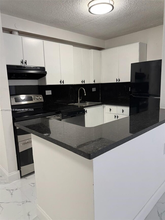Building Photo - 7010 NW 179th St Unit 105 Rental