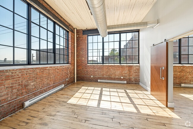 2BR, 1BA - 1,050SF - Living Room / Dining Room - Cooperage 214