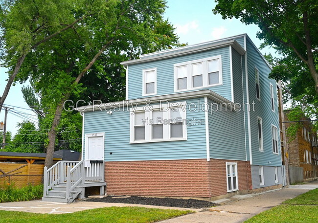 Building Photo - 1501 N Leamington Ave Unit 2