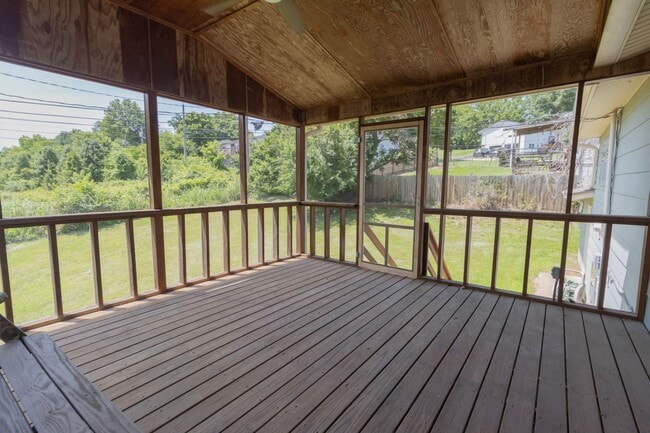 Photo - Charming 3BR Home-Screened Porch, Private Garage & Massive Backyard