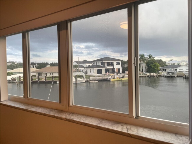 Building Photo - 698 NE Spanish River Blvd Unit 23