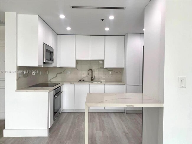 Building Photo - 201 Crandon Blvd Unit 306