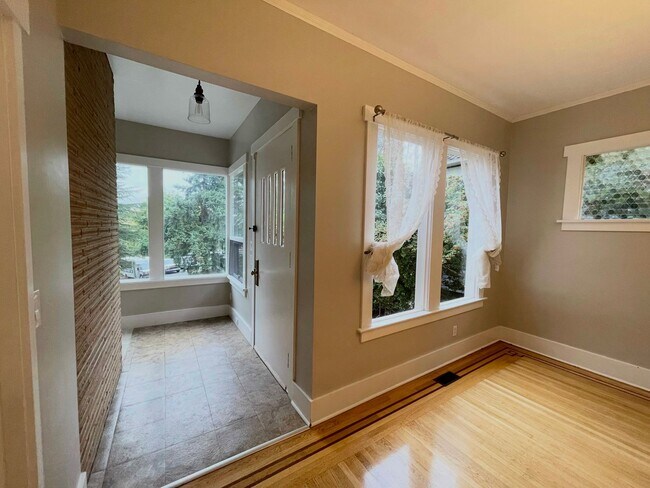 Photo - Elegant 4BR 2.5Bath Home with Fenced Yard & Garage Across from Seattle Prep**2 weeks free**