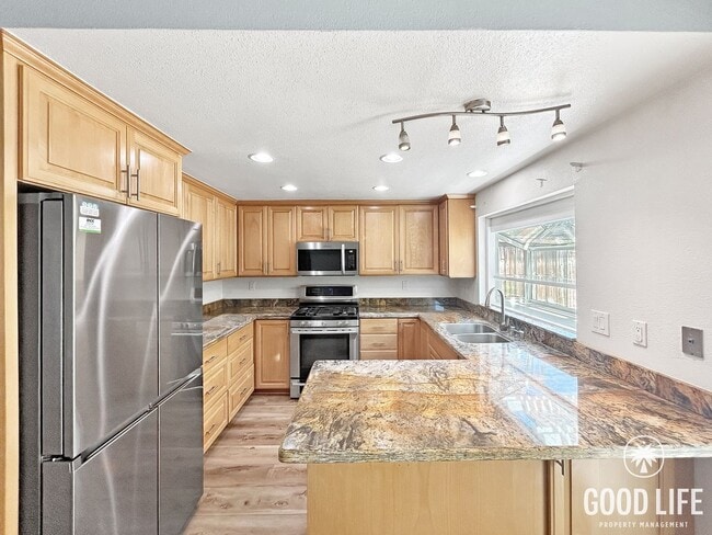 Photo - Beautiful 3BD/2BA w/ A/C, In-Unit Laundry, and 2-Car Attached Garage in San Carlos!