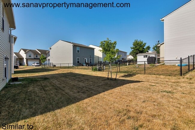 Photo - Stunning 4-Bedroom Home in Prime Norwalk Location with Open-Concept Living with fenced backyard