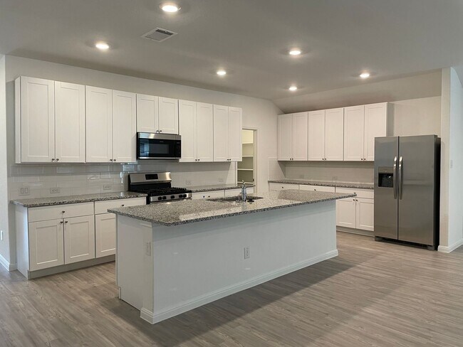 Photo - 3/2/2 with flex room in Heather Glen / Large Backyard / Ring Door Bell / Fridge Included /Communi...