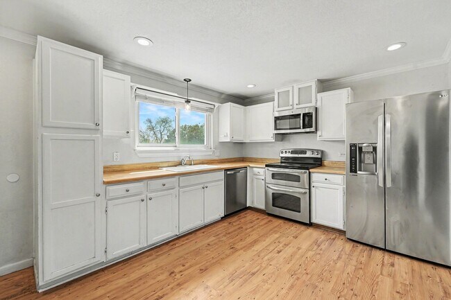 Photo - Exceptional and spacious three bedroom, two bath home in Thornton.