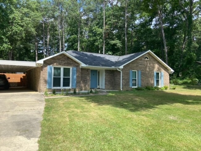 Building Photo - Welcome to this charming 3-bedroom, 2-bath...