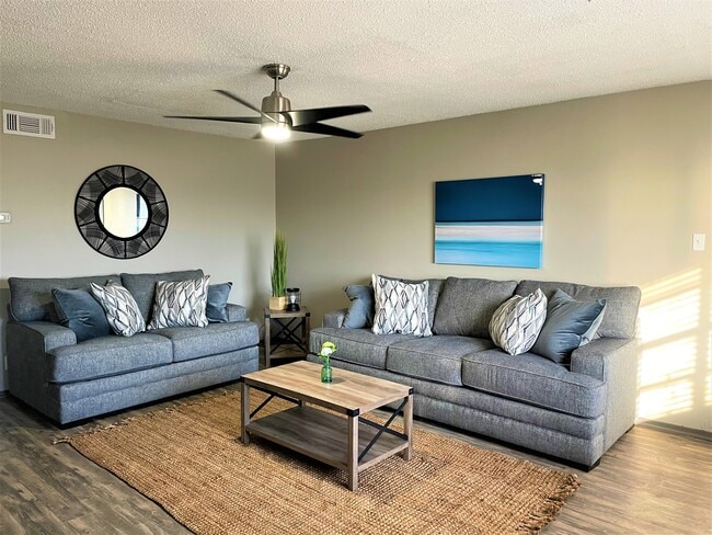 sala de estar 3 hab. - River Walk Apartments