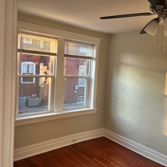 Bedroom stained glass windows in family room - 4966 Reber Pl Unit 1W