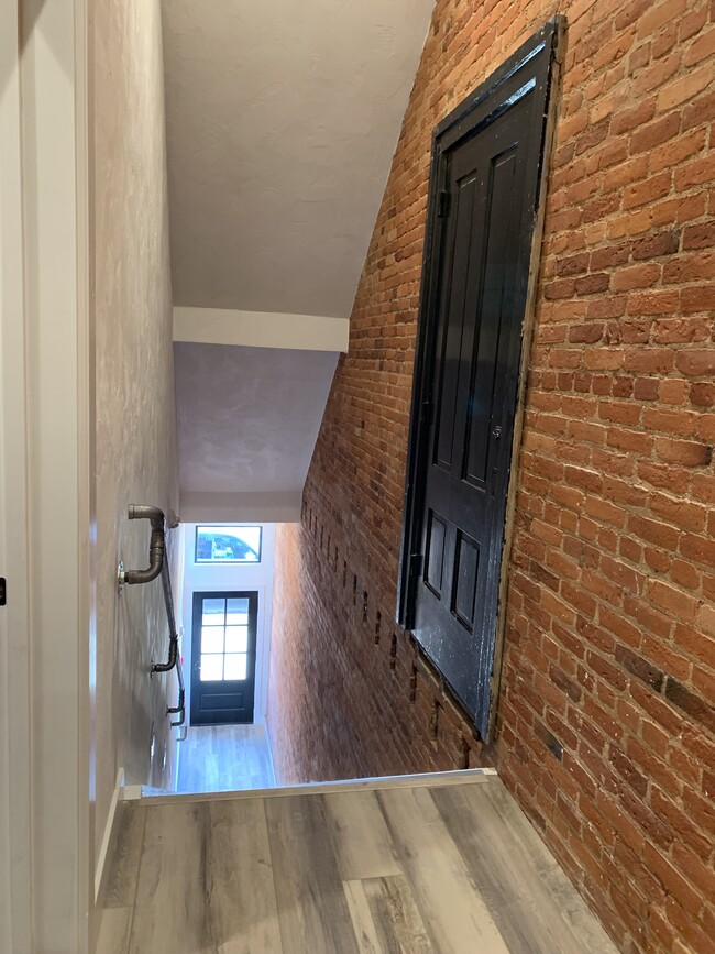 Front stairway - 106 W Michigan Ave Apartments Unit The Flat