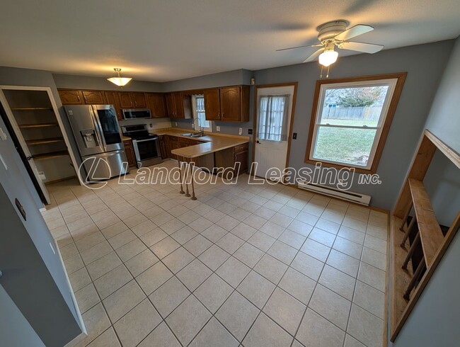 Photo - Spacious Elyria Split-Level Near LCCC with Fireplace & Fenced Yard