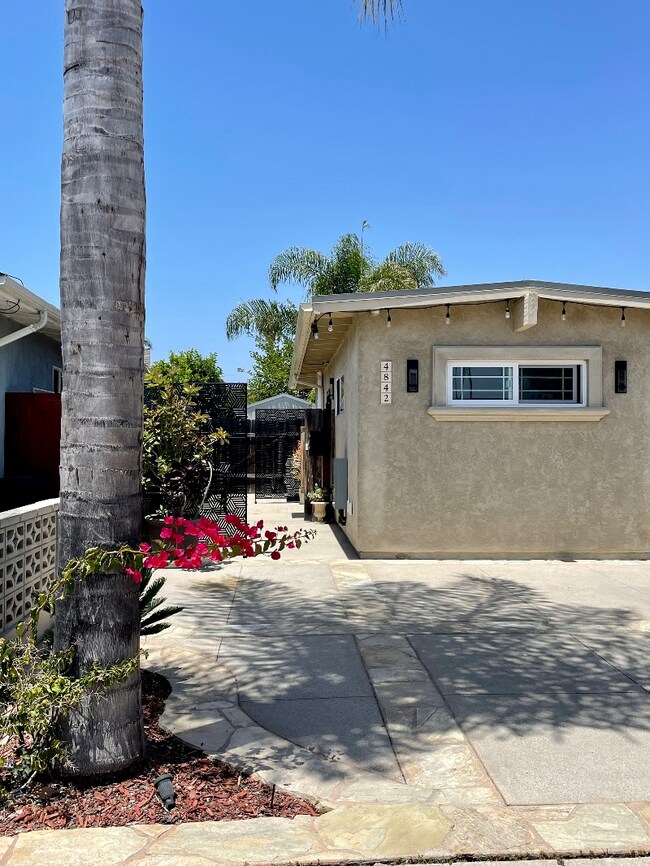 Welcome to your "Dream Duplex" in the heart of San Diego. Park right outside private gated entrance. - 4842 Barstow St Townhome