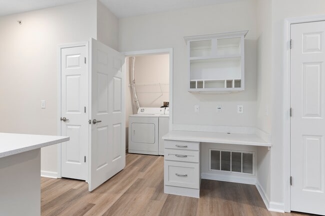 The Charleston Magnolia Premium Renovated Laundry room with Full Size washer and dryer included