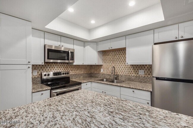 Building Photo - 18202 N Cave Creek Rd Unit 209