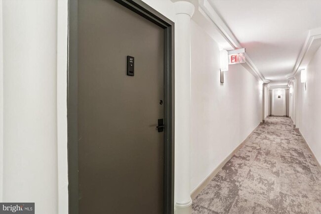 Building Photo - 950 25th St NW Unit 407-N