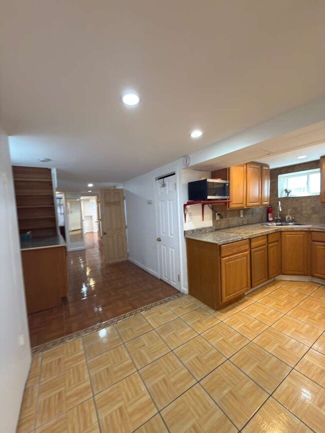 Building Photo - 1138 89th St Unit Ground apartment for rent