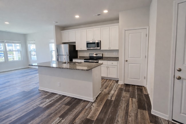 Photo - COMING SOON: 3BR Townhome • Full Kitchen • Garage + Driveway